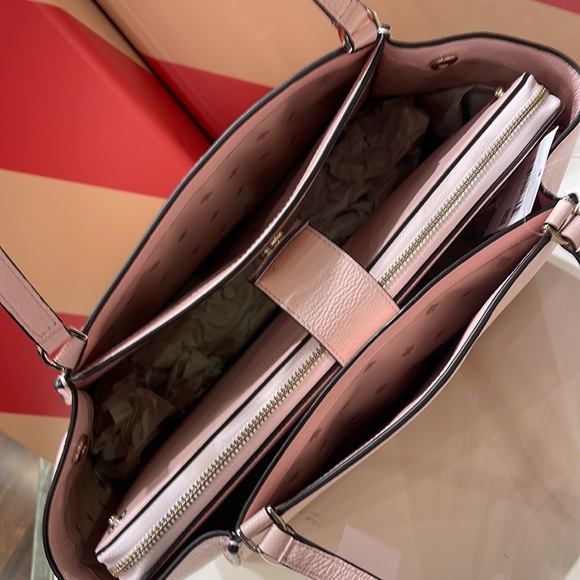 Kate Spade Brim Laptop Tote 

COLOR:
Chalk Pink - Picture 9 of 16